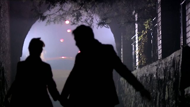 Silhouette of two people runing through the secret pass