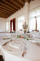 Fine table setting in gourmet restaurant