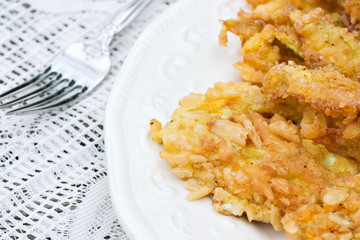 Delicious crispy fried pumpkin blossoms.