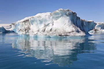 Iceberg and Reflection on the Lagoon, Jokulsarlon, Iceland