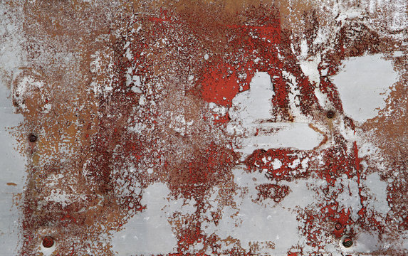 red painted aluminium background with peeled off color