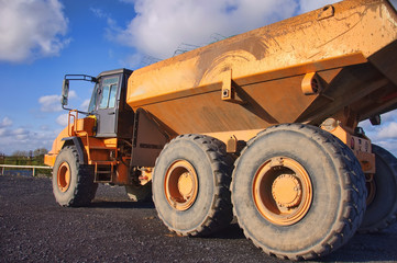 Obraz premium large yellow industrial heavy earth loader outside