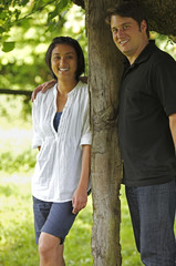 Couple in the shadow of a tree