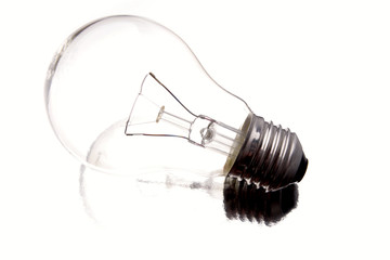 Clear light bulb on white background