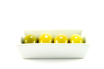 Four Green Olives in a Dish