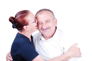 Elderly couple kissing isolated