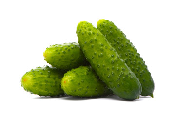 Fresh cucumbers on studio white