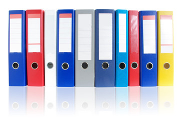 Row of multicolored ring binders