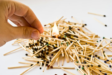 match blazes on background sprinkled match