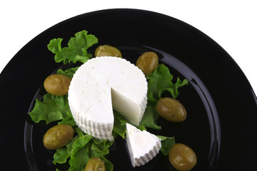 soft feta cheese with gold olives