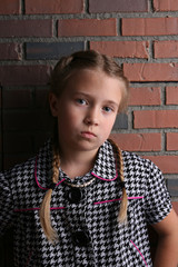 pretty young girl with angry looking pout