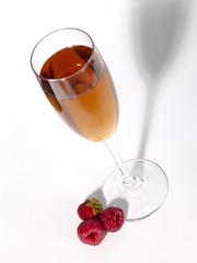 Berries and wine still-life with glass shadow.