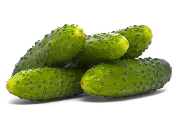 Fresh cucumbers on studio white