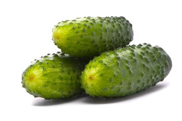 Fresh cucumbers on studio white