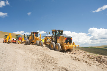 Excavator, digger, earthmover at construction site