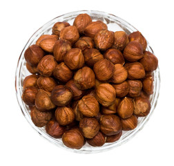 many hazelnuts isolated on white background
