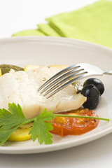 fillet of cod baked tomatoes zucchini black olives