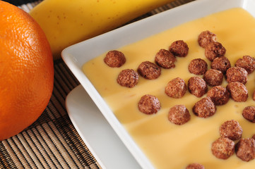 Chocolate cereal on yogurt