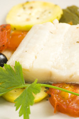 fillet of cod baked tomatoes zucchini black olives