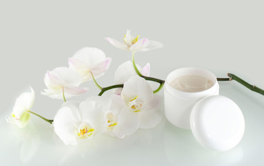 face cream and white orchid