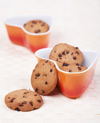 chocolate chip cookies in heart shape bowl
