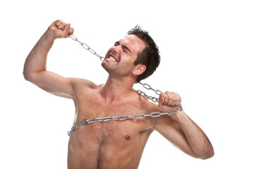 Young muscular man with a chain isolated on white