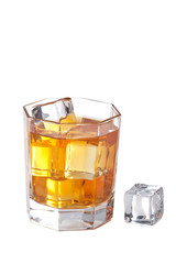 glass of whisky with ice cubes isolated