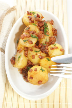 Warm Potato Salad With Bacon In A Bowl