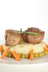 medallion of pork fillet mashed potato and pea