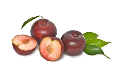 Plum and sections isolated on white background