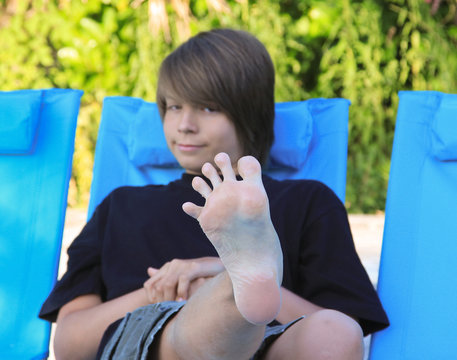 Cute teen boy feet