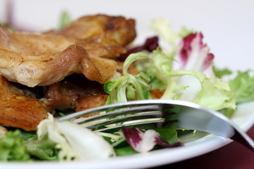 roasted chicken meat with much salad