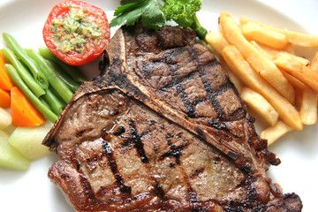 T-Bone Steak with Irresistible Texture. Feast your eyes on a tantalizing close-up photograph of a...