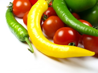 Chilli peppers with cherry tomatoes and green paprika