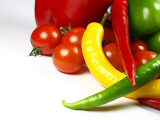 Chilli peppers with cherry tomatoes and green paprika