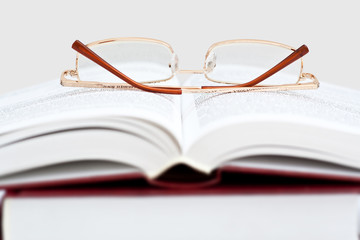 books with eyeglasses