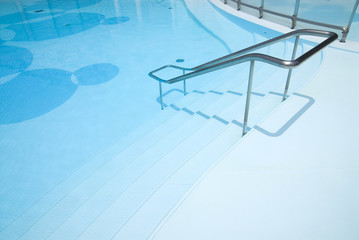 pool entrance with hand rails