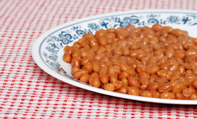 Baked beans in tomato sauce on a plate