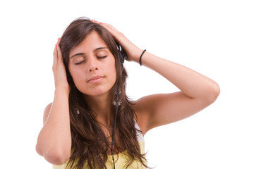 Fototapeta premium Young girl listening to music