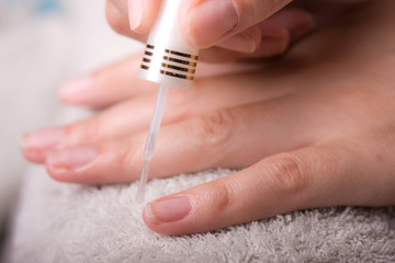 Closeup of hands doing manicure