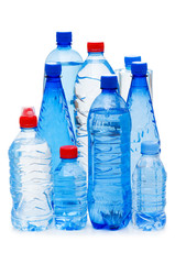 Naklejka premium Bottles of water isolated on the white