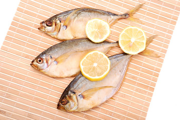 Smoked fish with a lemon