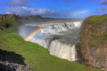 Waterfall with rainbow in iceland