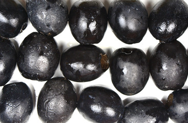 black olives on white background