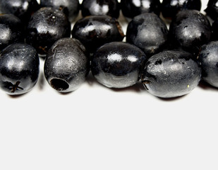 black olives on white background