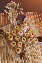 Hearts of palm canapes topped with stuffed olives