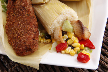 Breaded fish or chicken and tamal