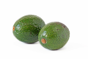 Green avocado isolated on white