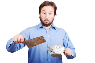 Young man in shirt is surprised by mason tools © Jasmin Merdan