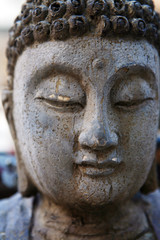 Fototapeta na wymiar buddha statue made from stone